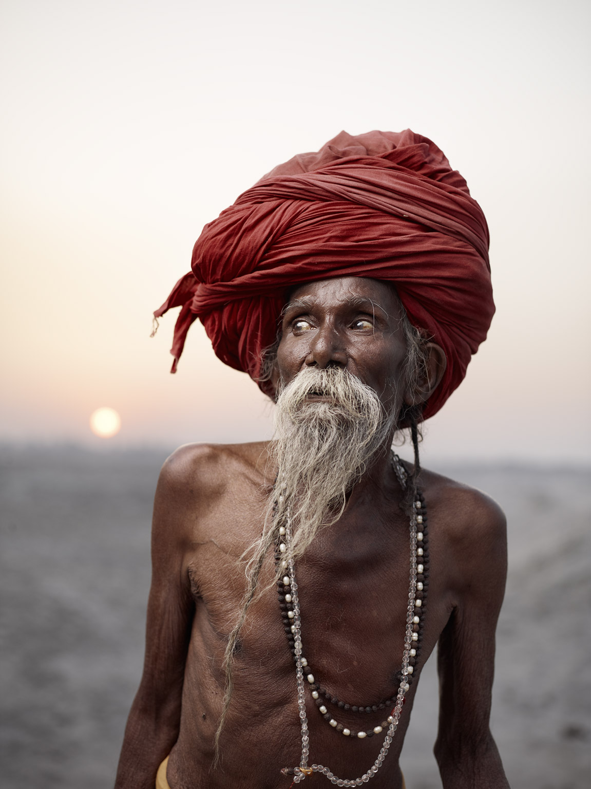 When he was young, Lal Baba’s parents arranged a marriage for him. Uncertain about his future, he ran away from home in Bihar Siwan and took up the lifelong task of becoming a sadhu. Varanasi, India  
(\"Holy Men\" Personal Series)